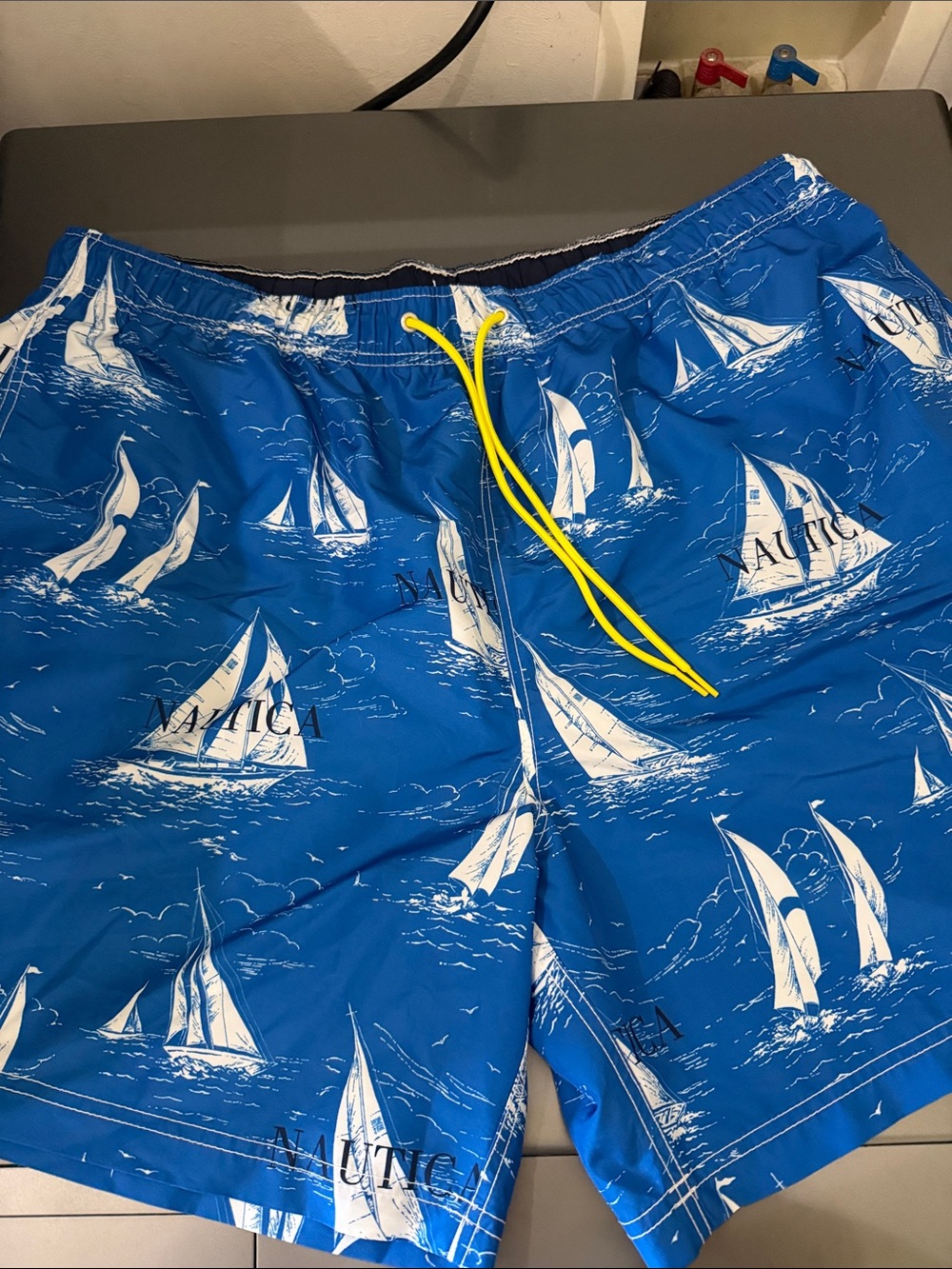 Nautica Blue Sailboat Print Swim Shorts with Yellow Drawstring